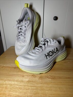 Hoka Women's White Running Shoes with Yellow Accents